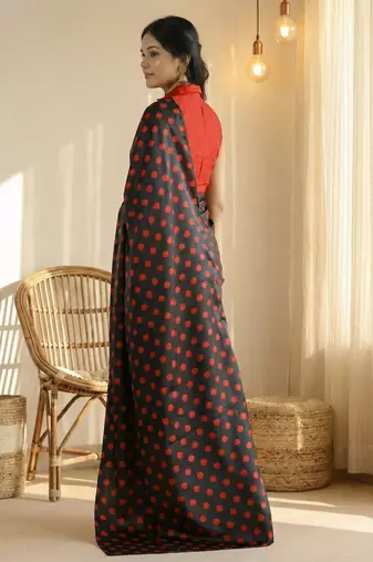 Black & red color polka dots printed japan satin saree with unstitched blouse