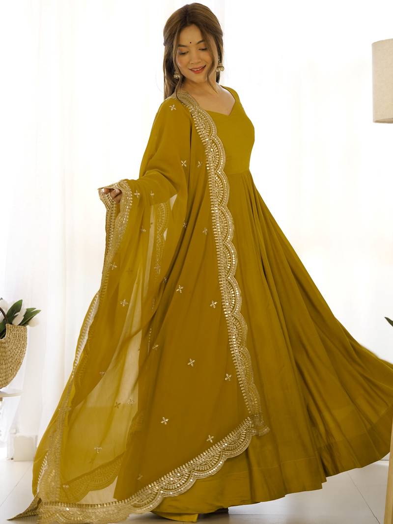 Ravishing Mustard Yellow Silk Anarkali Pant Suit With Sequins Dupatta