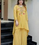 Elegant  yellow  crepe kurta palazzo set with embroidered yoke