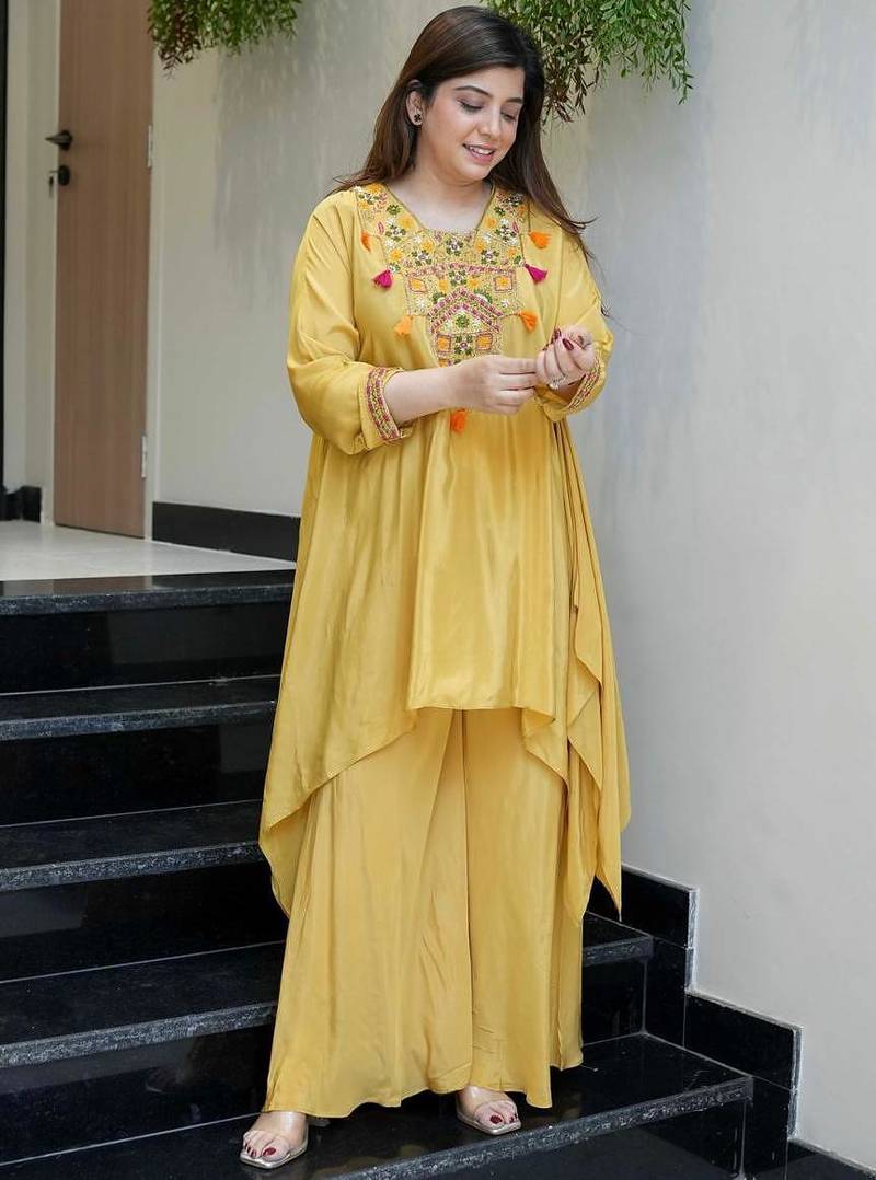 Elegant  yellow  crepe kurta palazzo set with embroidered yoke
