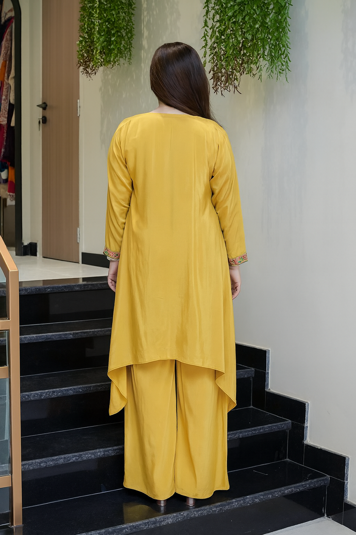 Elegant  yellow  crepe kurta palazzo set with embroidered yoke