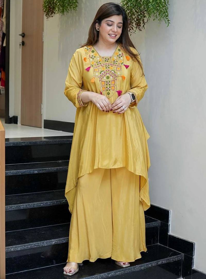 Elegant  yellow  crepe kurta palazzo set with embroidered yoke