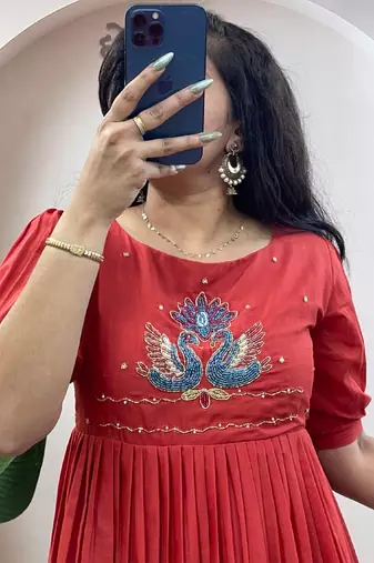 Orange pure mul cotton handwork kurti with designer sleeves