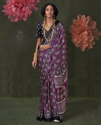 Printed ajrakh satin crepe saree art with a modern touch 1