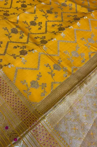 Banarasi  pure silk chiniya saree in mustard colour with floral  zari zig-zag pattern with red colour meenakari
