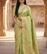 Banarasi  pure silk chiniya saree in pista green colour with floral  zari zig-zag pattern with red colour meenakari