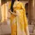 Banarasi pure silk cotton saree in mustard colour with floral zari and meenakari work