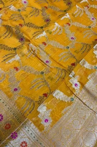 Banarasi pure silk cotton saree in mustard colour with floral zari and meenakari work