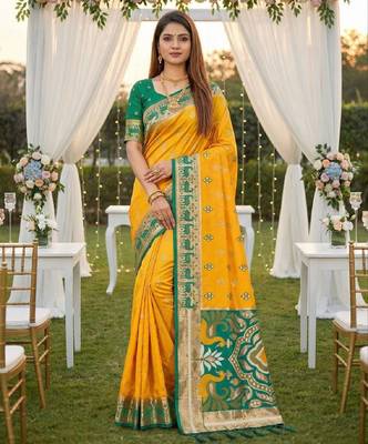 Yellow soft saree with zari weawing meenakari rich pallu and unique ikkat border 1