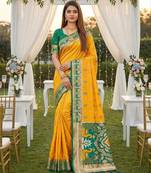 Yellow soft  saree with zari weawing meenakari rich pallu and unique ikkat border