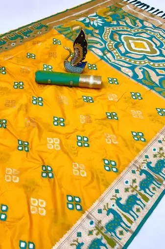 Yellow soft saree with zari weawing meenakari rich pallu and unique ikkat border