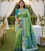 Green soft  saree with zari weawing meenakari rich pallu and unique ikkat border