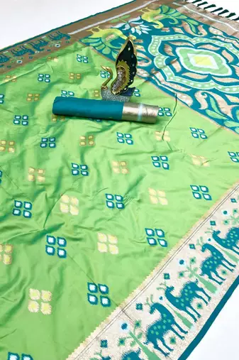 Green soft saree with zari weawing meenakari rich pallu and unique ikkat border