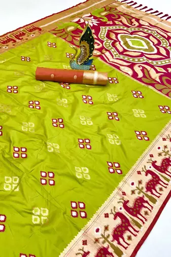 Green soft saree with zari weawing meenakari rich pallu and unique ikkat border