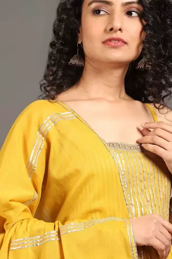 Yellow mulmul swarn mohini anarkali set