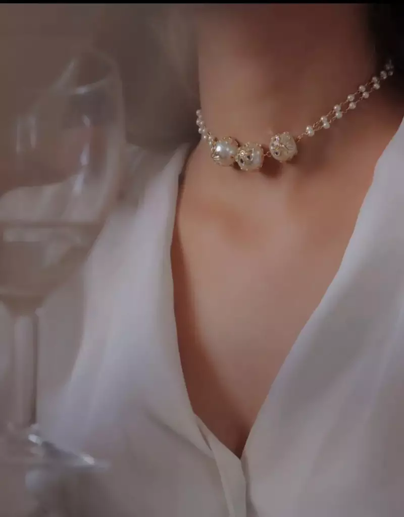 Kiran double-strand gold-toned beaded necklace