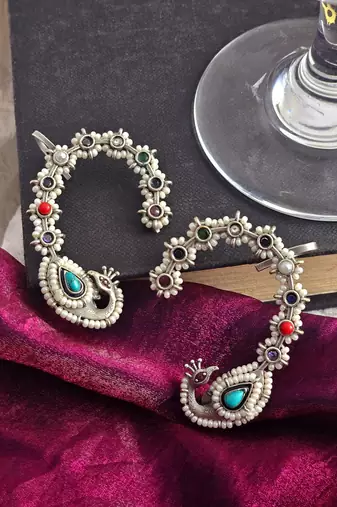 Floral mirage peacock earcuff