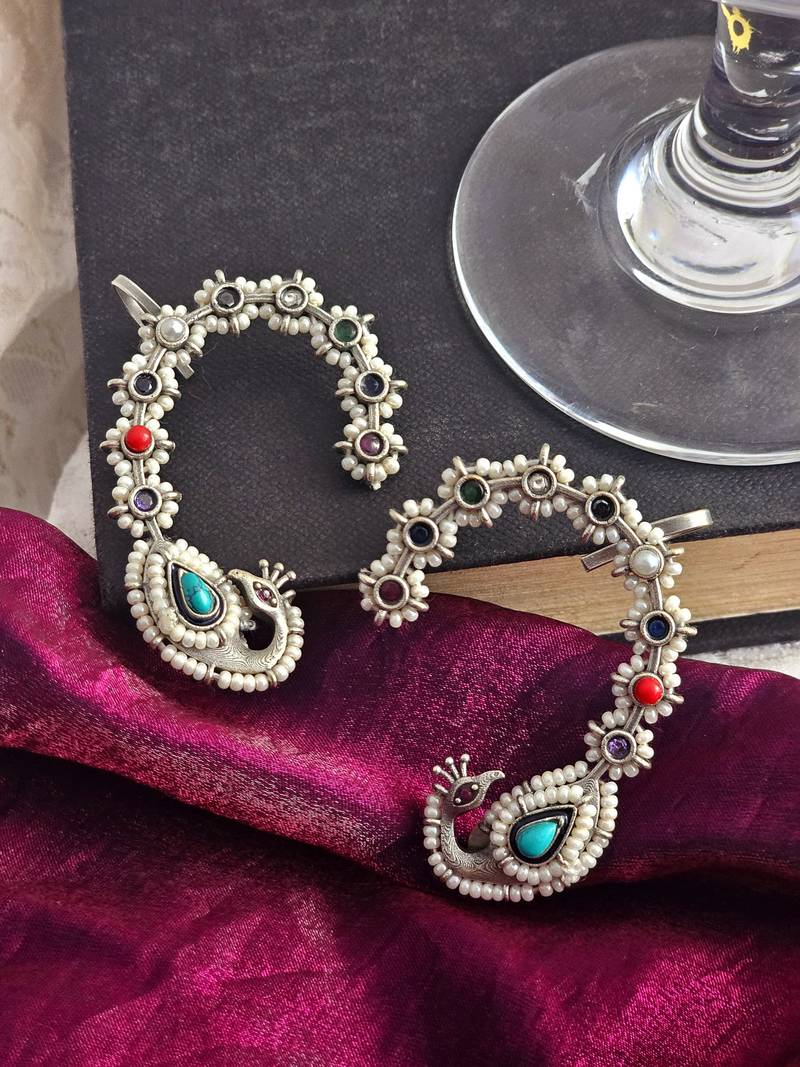 Floral mirage peacock earcuff