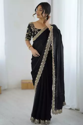 Black georgette embriodered lace saree with embriodered blouse piece.