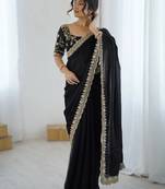 Black georgette embriodered lace saree with embriodered blouse piece.