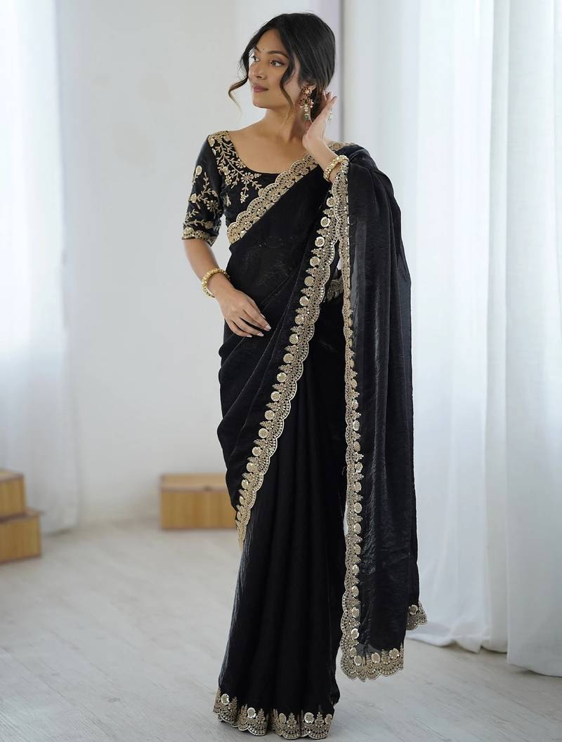 Black georgette embriodered lace saree with embriodered blouse piece.