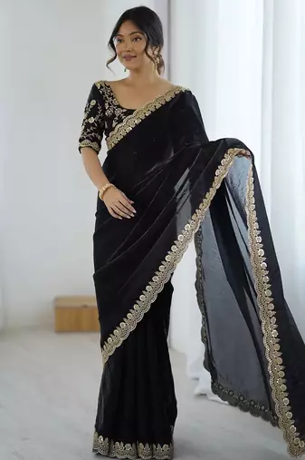 Black georgette embriodered lace saree with embriodered blouse piece.