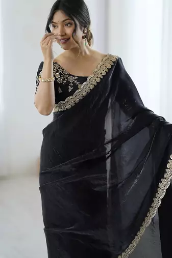 Black georgette embriodered lace saree with embriodered blouse piece.