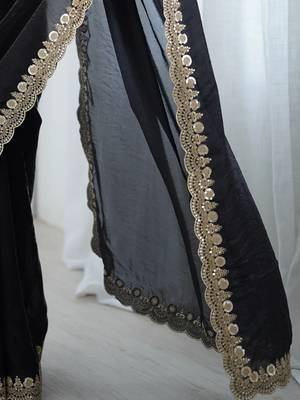 Black georgette embriodered lace saree with embriodered blouse piece. 4