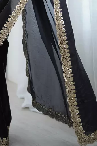Black georgette embriodered lace saree with embriodered blouse piece.