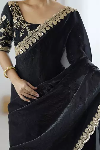 Black georgette embriodered lace saree with embriodered blouse piece.