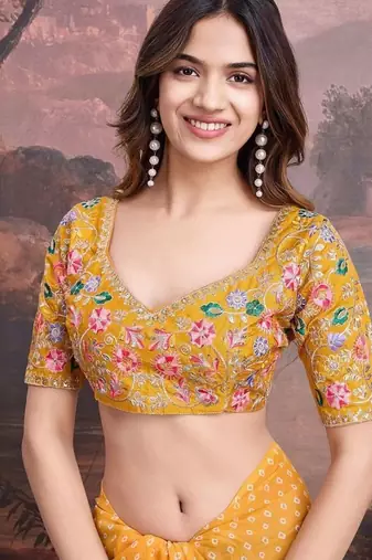 Yellow georgette embriodered lace saree with blouse piece.