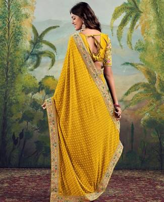 Yellow georgette embriodered lace saree with blouse piece. 4