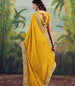 Yellow georgette embriodered lace saree with blouse piece.