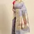 Banarasi silk blend saree in grey colour with meenakari work