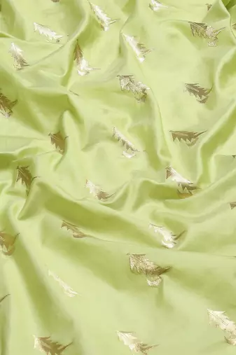 Banarasi silk blend saree in pista green colour with meenakari work