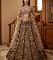 Grand Beige Zari Embroidery Net Sangeet Wear Lehenga Choli With Dupatta