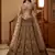 Grand Beige Zari Embroidery Net Sangeet Wear Lehenga Choli With Dupatta