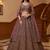 Luxurious Mauve Dori Work Net Reception Wear Lehenga With Blouse