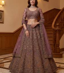 Luxurious Mauve Dori Work Net Reception Wear Lehenga With Blouse