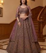 Luxurious Mauve Dori Work Net Reception Wear Lehenga With Blouse