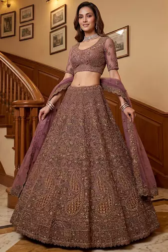 Luxurious Mauve Dori Work Net Reception Wear Lehenga With Blouse