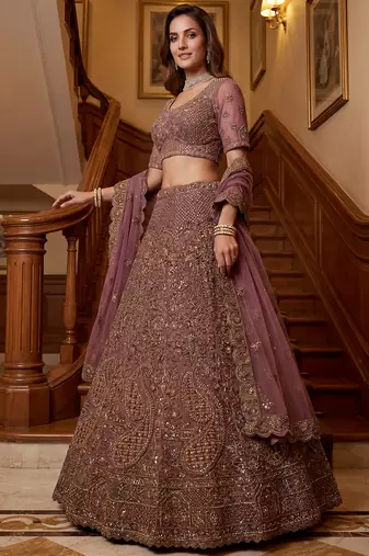 Luxurious Mauve Dori Work Net Reception Wear Lehenga With Blouse