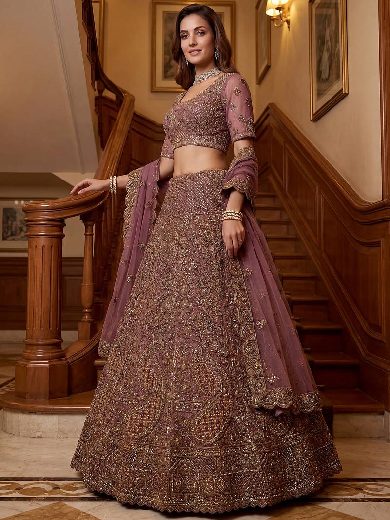 Luxurious Mauve Dori Work Net Reception Wear Lehenga With Blouse