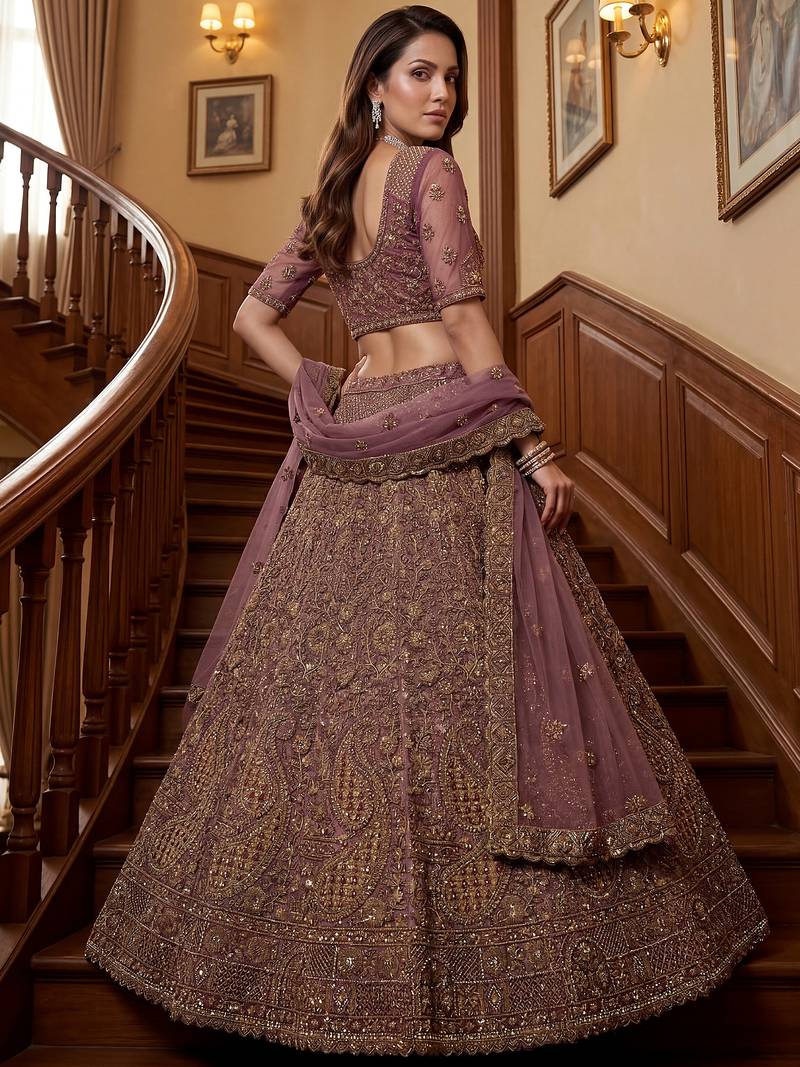 Luxurious Mauve Dori Work Net Reception Wear Lehenga With Blouse