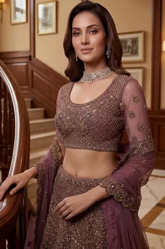Luxurious Mauve Dori Work Net Reception Wear Lehenga With Blouse