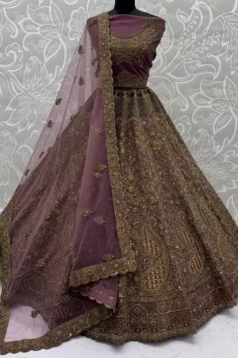 Luxurious Mauve Dori Work Net Reception Wear Lehenga With Blouse