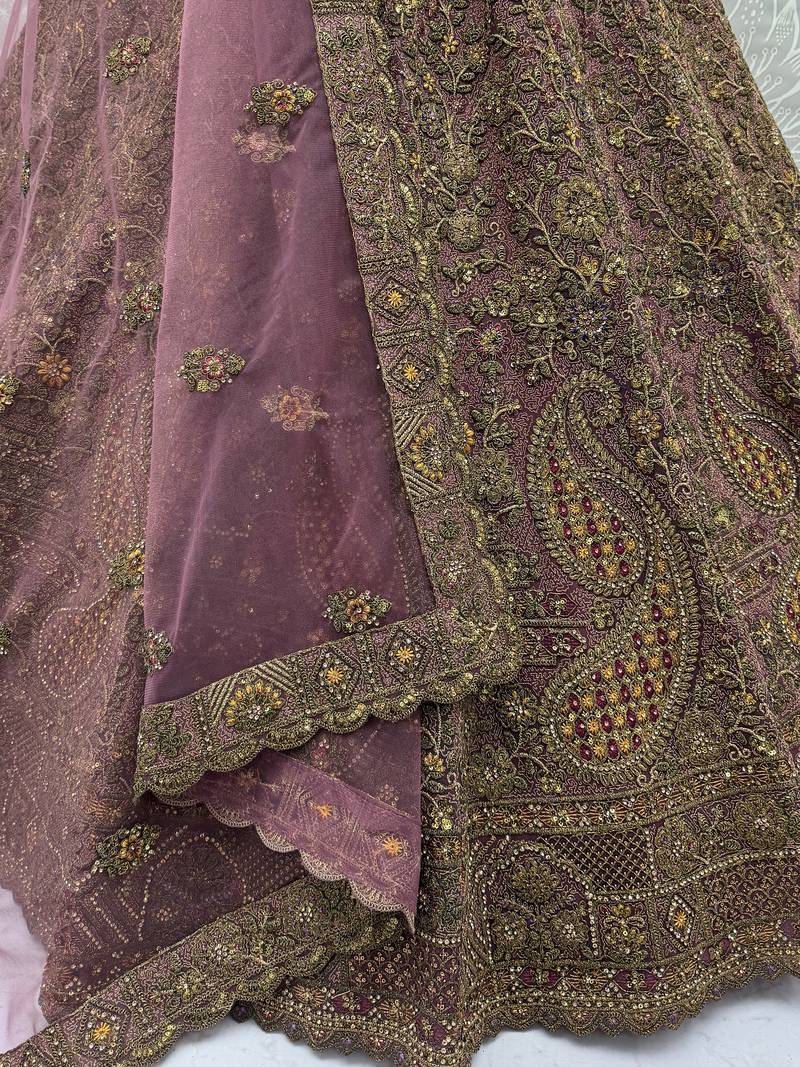 Luxurious Mauve Dori Work Net Reception Wear Lehenga With Blouse