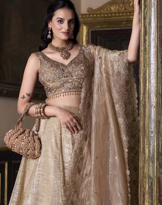 Eilara Women's Beige sequins and thread embroidered gold rush fabric indian designer latest design wedding lehenga dress 3