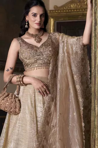 Eilara Women's Beige sequins and thread embroidered gold rush fabric indian designer latest design wedding lehenga dress