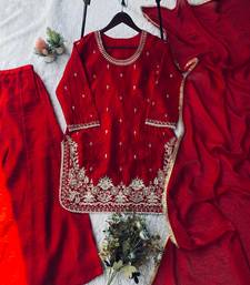 Traditional red silk embroidered sharara suit with gold accents
